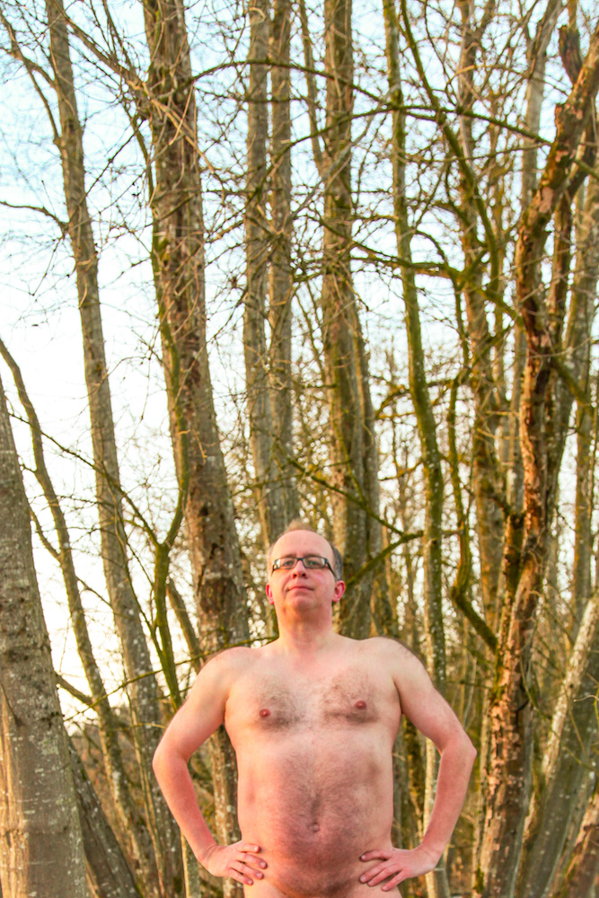 Man in the buff in the forrest