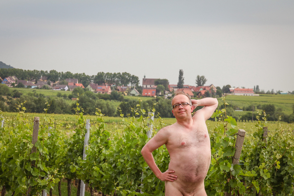 Bare man in French vineyard