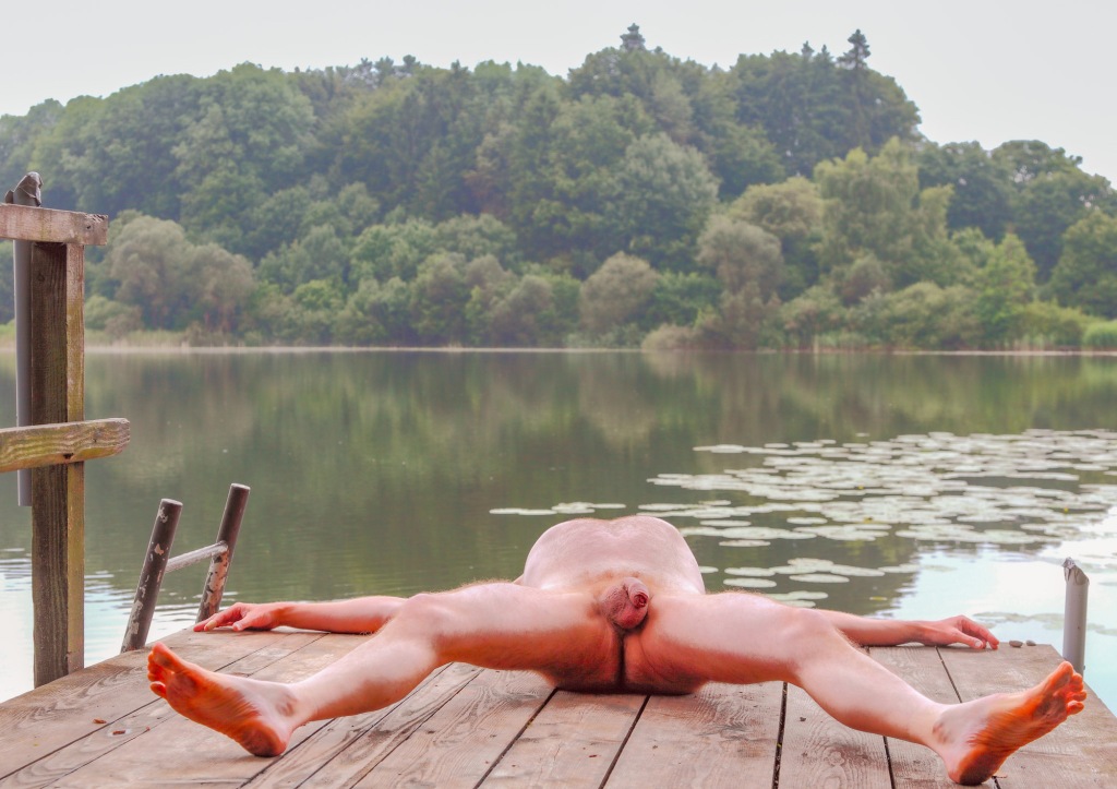 Male nude showing his cock and balls at Niklassee close to Bad Schussenried, Germany